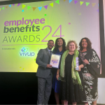 People from South Yorkshire ICB on stage at the Employee Benefits Awards 2024, collecting their award